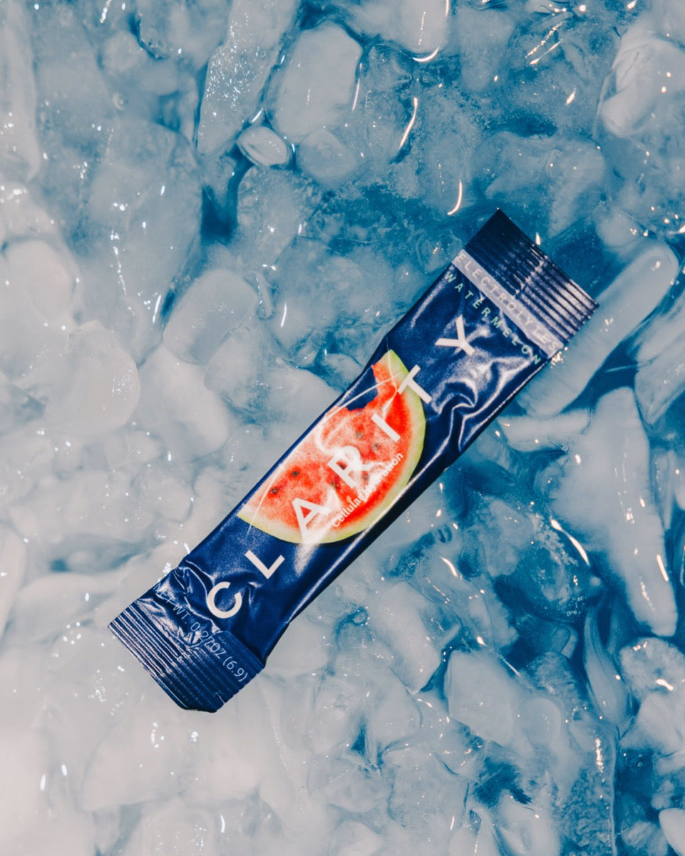 Clarity watermelon electrolyte stick pack resting on ice